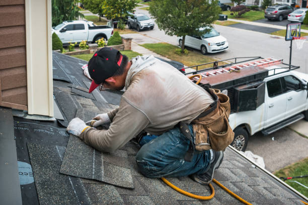 Professional Roofing technician working in Carman, IL